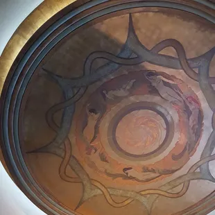 Mural on ceiling. Very old school theater feel