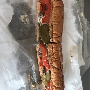 12&quot; cheesesteak with peppers, onions, mushrooms and provolone cheese.
