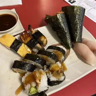 Maguro, Unagi, hamachi, Leona hand roll, and San Francisco long roll