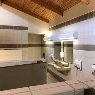 Clean bathroom, the low stall walls make me think about the rest stop scene from "Something About Mary"