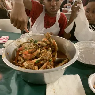 She about to grub at the Cioppino feed