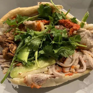 Banh Mi B13 Banh Mi Sai Saigon Specialty Sandwich. Red roast pork, pork loaf, grilled pork, meatballs Viet mayo and pate. Always the best