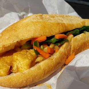 Banh mi w/tofu ($4.50), vegan by omitting mayo. Meh. Mealy bread, flavorless tofu.