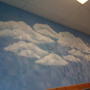 Serenity painted on the wall while we wait for our apps!