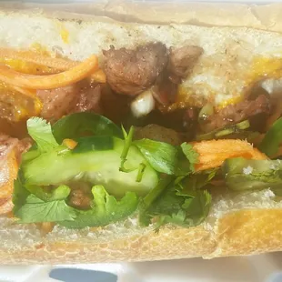 Pork Bahn MI, good lots of fatty pieces and it wasn&apos;t enough meat or filling and the herbs were a bit old.