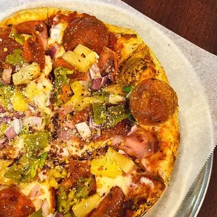 a pizza on a plate on a table