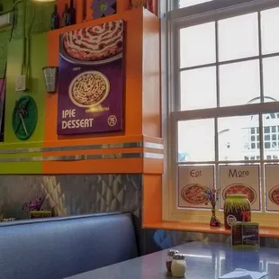 a view of a colorful restaurant