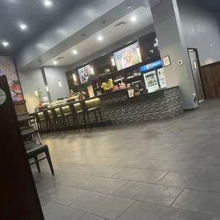 Bar area where sushi is being made.