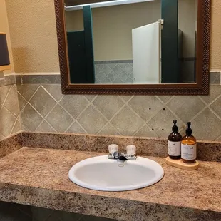 Women&apos;s bathroom sink. They even have lotion!