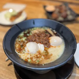 Karaka ramen. Spicy part is on top so was able to scoop off and add how much I wanted. Nothing amazing 4/5