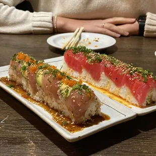 Albacore roll on the right; dragon roll left