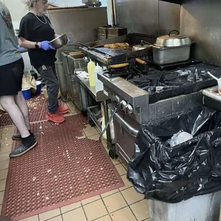 Nasty ass grill  oh and take a look at the bag of fries sitting on the ground just chilling