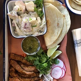Carne Asada Platter (w/ flour tortillas) and a side of poblano pepper potato salad.