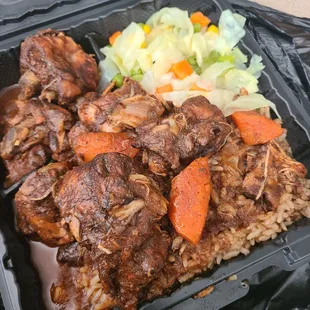 a plate of meat and rice