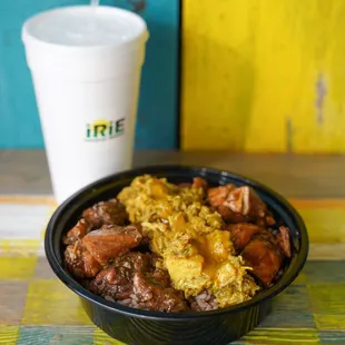 a bowl of food and a drink