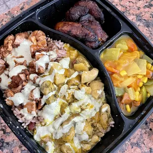 Half + Half box with plantains and curry vegetables.