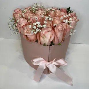 Two Tiered Luxury with dipped strawberries in the second layer.