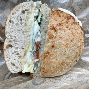 Popeye Scrambler on a Parmesan bagel