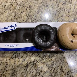 SMALL Chocolate Chip Bagel next to a donut.