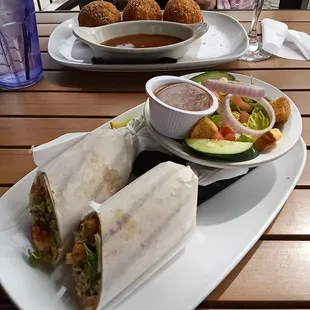 Foreground cajun shrimp wrap, rear sheperd's pie boxty.