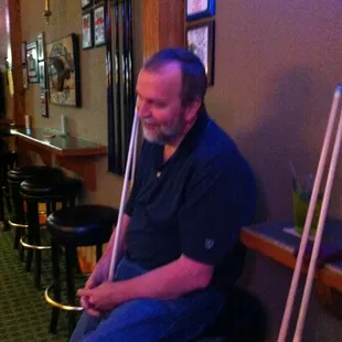 a man sitting at a bar
