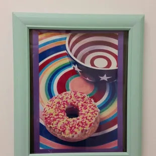 a picture of a donut with sprinkles