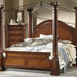 Large poster canopy bed.