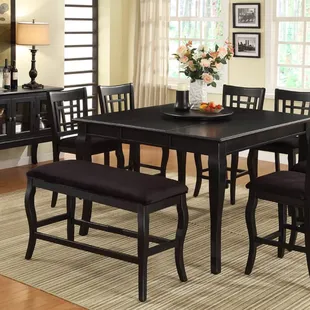 Black 54" Counter height dining set with lazy susan and bench.
