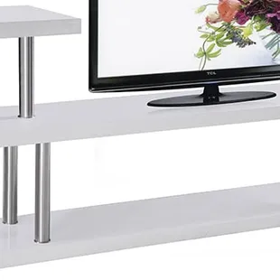 Modern white lacquer and chrome TV stand with shelves.
