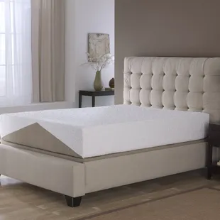 Harmony 11 3/4" gel infused Memory foam mattress on white platform bed.