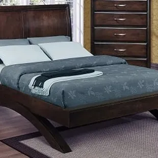 Queen or King Arch Bed with panel headboard in dark espresso finish.