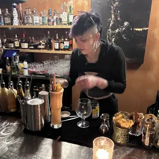 Sit at the bar and watch your cocktail creations being made.