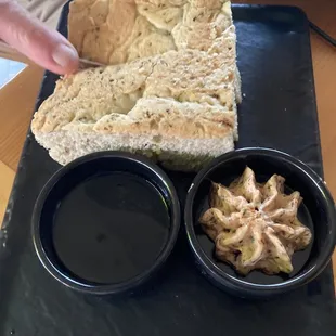 Focaccia Service with both dried tomato mixed olive butter and balsamic