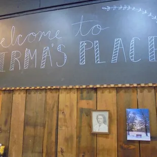 A giant chalkboard sign in the dining room.