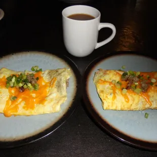 Two a la cart meat &amp; cheese omelets.
