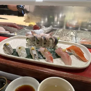 Hikarimono and beyond combo. L to R:  Kohada, octopus, sardine, forgot the name , mackerel (I think Japanese, not Spanish) , salmon