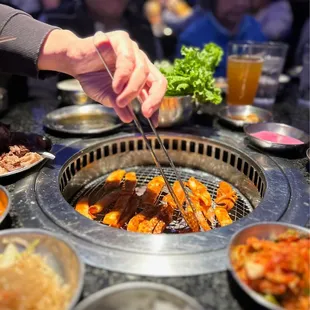 a person grilling food