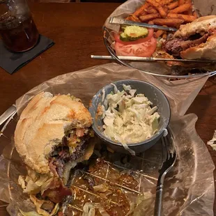 Half eaten JUNK Burger and Cole. They might consider renting cots for naps before you head out on I-80 again!