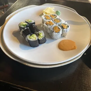 Avocado roll and sweet potato roll with a side of spicy mayo sauce