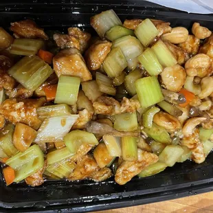 a container of chicken and vegetables