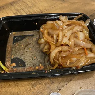 Half of the Mongolian chicken was just onions! There was also green &amp; red peppers, green onion, and carrots, and some chicken.