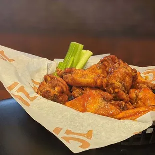 a basket of chicken wings