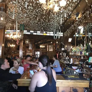 people sitting at a bar