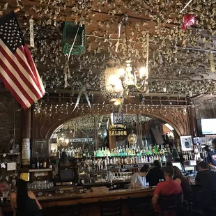 people sitting at a bar