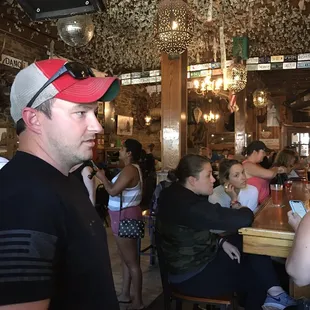 a group of people sitting at a table