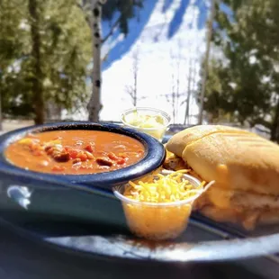 Crash and burn w/ house made chili BBQ Chicken/cheddar cheese/ crispy onion/bacon on Ciabatta