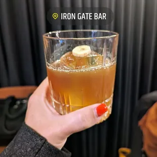 a person holding a drink