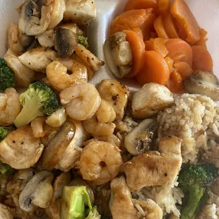 chicken, broccoli, carrots and rice