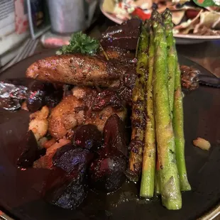 Golden Chicken Breast served over Garlic Parmesan, Roasted Potatoes and grilled asparagus. Finished with a rich mushroom sauce.