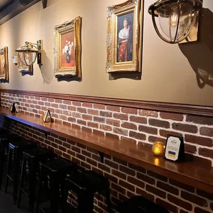 a brick wall and bar